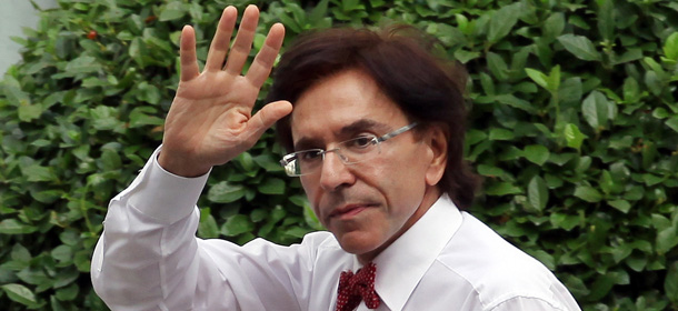 Belgian prime minister-in-waiting Elio Di Rupo waves as he arrives at the 10 Law Street, after an audience with Belgian King Albert II in Laeken/Laken in Brussels, on October 6, 2011. The government&#8217;s negotiations continue, 480 days after the general elections of June 13, 2010. AFP PHOTO / BELGA / JULIEN WARNAND (Photo credit should read JULIEN WARNAND/AFP/Getty Images)
