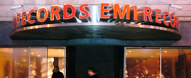 LONDON &#8211; FEBRUARY 24: Pedestrians walk past the EMI Records office February 24, 2003 in London, England. (Photo by Jack Hill/Getty Images)
