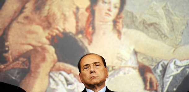 Italian Prime Minister Silvio Berlusconi gives a news conference at Chigi Palace in Rome on August 4, 2011. Berlusconi promised sweeping measures to boost the economy by September following talks with trade unions and big business under heavy pressure from the markets. The plan will include constitutional enforcement of balanced budgets plus social welfare and labour market reforms, privatisations, an acceleration of public infrastructure projects as well as cuts to bureaucracy, he said. AFP PHOTO / VINCENZO PINTO (Photo credit should read VINCENZO PINTO/AFP/Getty Images)
