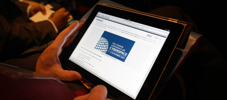 A delegate works on a tablet computer at the London Conference on Cyberspace in London on November 1, 2011. Government officials, tech firms, NGOs, bloggers and security experts from more than 60 countries are at the two-day talks. AFP PHOTO / POOL / PETER MACDIARMID (Photo credit should read PETER MACDIARMID/AFP/Getty Images)
