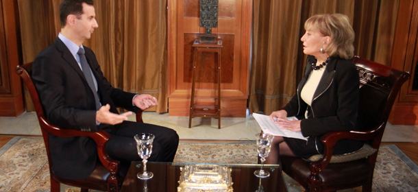 In this undated image provided by ABC, Syrian President Bashar Al-Assad speaks with ABC News Anchor Barbara Walters for an interview airing Wednesday, Dec. 7, 2011, on ABC. Assad denied he ordered the deadly crackdown on a nearly 9-month-old uprising in his country, claiming he is not in charge of the troops behind the assault. Speaking to Walters in a rare interview that aired Wednesday, he maintained he did not give any commands &#8220;to kill or be brutal.&#8221; (AP Photo/ABC, Rob Wallace)
