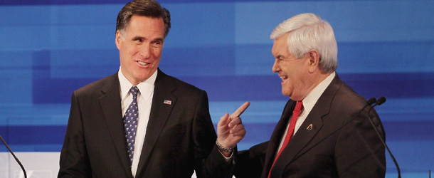 SIOUX CITY, IA &#8211; DECEMBER 15: Republican presidential candidate former Speaker of the House Newt Gingrich (R) and former Massachusetts Gov. Mitt Romney chat after finishing the Fox News Channel debate at the Sioux City Convention Center on December 15, 2011 in Sioux City, Iowa. The GOP contenders are in the final stretch of campaigning in Iowa where the January 3rd caucus is the first test the candidates must face before becoming the Republican presidential nominee. (Photo by Scott Olson/Getty Images)
