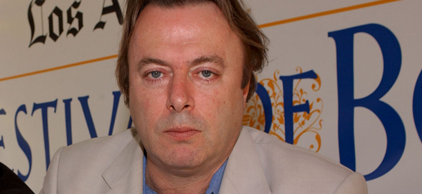 WESTWOOD, CA &#8211; APRIL 25: Writers Mark Danner and Christopher Hitchens (L-R) sign copies of their books at the 9th Annual LA Times Festival of Books on April 25, 2004 at UCLA in Westwood, California. (Photo by Amanda Edwards/Getty Images)
