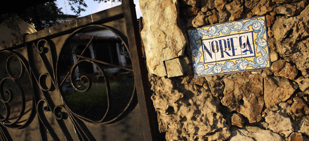 The entrance to a mansion, formerly owned by Panama&#8217;s former dictator Manuel Noriega and currently owned by the state, is seen in Panama City, Monday, April 11, 2011. According to the Ministry of Economy and Finance, there were no bidders at Monday&#8217;s auction on Noriega&#8217;s former properties. (AP Photo/Arnulfo Franco)
