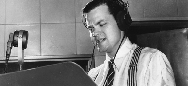 Orson Welles delivers a radio broadcast from a New York studio in 1938. On the same year on Oct. 30, he broadcasted the adaptation of H.G. Wells&#8217; &#8220;War of the Worlds.&#8221; The realistic account of an invasion from Mars caused thousands of listeners to panic. (AP Photo)
