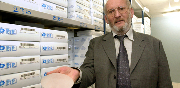 A file picture taken on January 17, 2011 in La Seyne-sur-Mer, southern France, shows the president of Poly Implant Prothese (PIP), Jean-Claude Mas, holding a breast implant. The international police organization Interpol launched on December 23, 2011 &#8220;red notice&#8221; to ask its members to the arrest of Jean-Claude Mas, it said on the website Interpol. Jean-Claude Mas, 72, is presented as sought by Costa Rica for attacks on &#8220;life and health&#8221;. The now-bankrupt Poly Implant Prothese (PIP) was shut down and its products banned last year after it was revealed to have been using non-authorised silicone gel that caused abnormally high rupture rates in its implants. AFP PHOTO ERIC ESTRADE (Photo credit should read ERIC ESTRADE/AFP/Getty Images)
