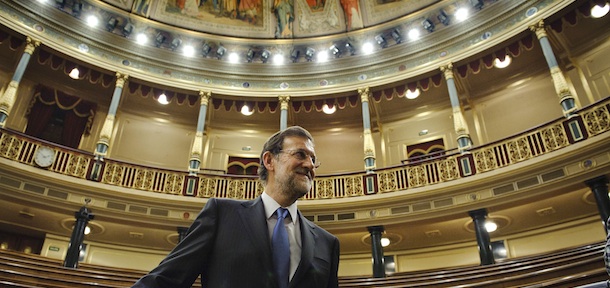 Spain&#8217;s conservative leader and the country&#8217;s next prime minister Mariano Rajoy poses at the Parliament after being elected as the new prime minister, in Madrid, Tuesday, Dec. 20, 2011. Spain&#8217;s Parliament voted conservative Popular Party leader Mariano Rajoy as premier on Tuesday. Spain&#8217;s borrowing costs have plummeted in a short-term debt auction, indicating market confidence in the country&#8217;s ability to handle its debt is recovering. (AP Photo/Daniel Ochoa de Olza)
