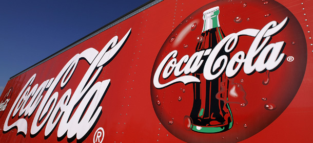 A Coca-Cola delivery truck is seen in Springfield, Ill., Wednesday, Nov. 10, 2010. Coca-Cola Bottling Co. earned the same amount of money in the third quarter as it did in the year-ago period, even as revenue rose. (AP Photo/Seth Perlman)