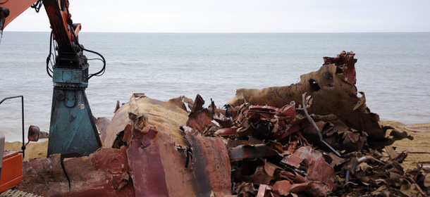 A picture taken on January 23, 2012 shows the remains of the TK Bremen cargo ship that ran aground on Kerminihy beach following the Joachim storm, two days ahead of the expected end of the dismantling operations of the ship. AFP PHOTO DAMIEN MEYER (Photo credit should read DAMIEN MEYER/AFP/Getty Images)