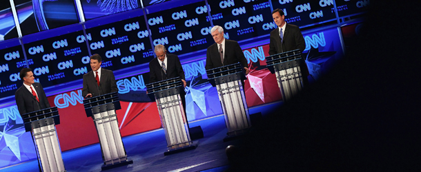 TAMPA, FL - SEPTEMBER 12: Republican presidential candidates (L-R) Mitt Romney, Gov. Rick Perry, Rep. Ron Paul, Newt Gingrich and Rick Santorum during a presidential debate sponsored by CNN and The Tea Party Express at the Florida State fairgrounds on September 12, 2011 in Tampa, Florida. The debate featured the eight candidates ten days before the Florida straw poll. (Photo by Win McNamee/Getty Images)