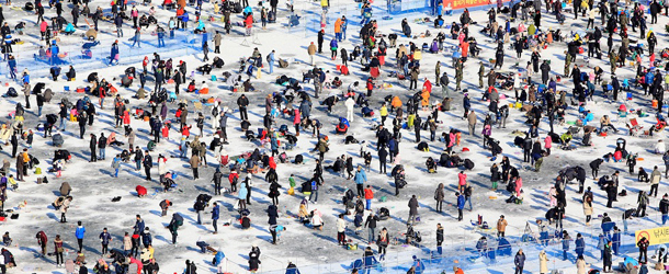 XXXX during an ice fishing competition at the Hwacheon Sancheoneo Ice Festival on January 7, 2012 in Hwacheon-gun, South Korea. The annual Hwacheon Sancheoneo (Mountain Trout) Ice Festival attracts millions of visitors annually who gather to try thier luck at ice fishing with traditional lures or with bare hands. The 3-week long event features several winters sports and games as well as an ice scultpure competition and takes place in what is considered the first region of Korea that freezes over during winter.