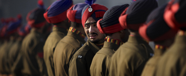Indian policemen stand in a line to participate in a parade during the Republic Day celebrations in Amritsar, India, Thursday, Jan. 26, 2012. India is marking it's 62nd Republic Day with parades across the country. (AP Photo/Altaf Qadri)