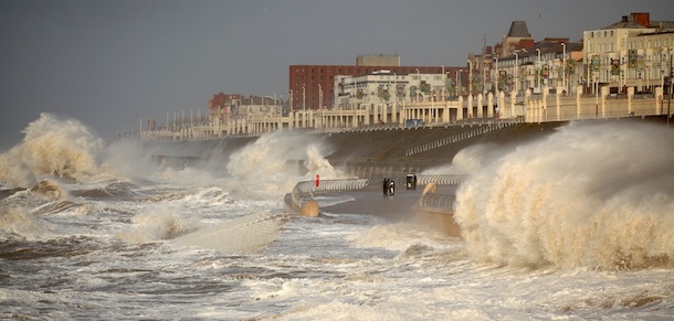 Waves whipped up by high winds crash against Blackpool promenade on December 28, 2011 in Blackpool, England. Most of the North West is bracing itself against high winds but the brunt of the gusts are hitting Scotland with road closures and sporting fixtures being postponed.