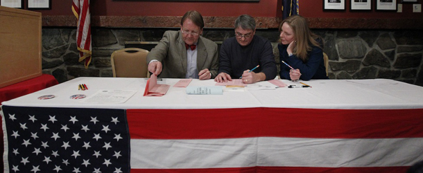 From left, Tom Tillotson, Rick Erwin, and Donna Kaye Erwin count ballots cast after midnigh in the first-in-the-nation presidential primary, at The Balsams Grand Resort, Tuesday, Jan. 10, 2012, in Dixville, N.H. (AP Photo/Matt Rourke)