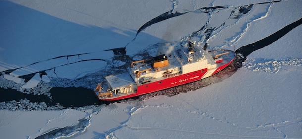 The 420-foot Coast Guard Cutter Healy breaks ice in the Bering Sea to assist the tanker Renda make way toward approximately 165 miles from Nome, Alaska, Sunday Jan. 8, 2012. The Coast Guard icebreaker is cutting a path through icy seas for a Russian tanker carrying much-needed fuel for the iced-in Alaska city of Nome. (AP Photo/U.S. Coast Guard/Petty Officer 3rd Class Jonathan Lally)