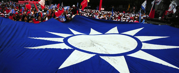 A large Taiwanese flag is seen at a campaign rally by Taiwan President and ruling Kuomintang (KMT) presidential candidate Ma Ying-jeou in Taipei on January 8, 2012. Ma enjoys a narrow lead over his opponents in his bid for re-election, poll results showed on January 3. Additional survey results will be released ahead of the January 14 vote. AFP PHOTO / AARON TAM (Photo credit should read aaron tam/AFP/Getty Images)