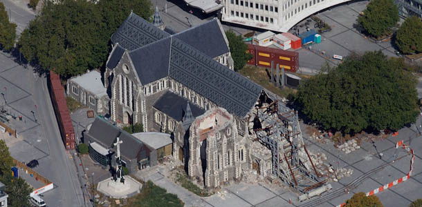 This aerial photograph shows the damaged Christchurch Cathedral in Christchurch on February 20, 2012 nearly one year after a 6.3 quake hit New Zealand's second largest city, killing 185 people, flattening office blocks, buckling roads and bringing historic buildings crashing down. More than 60 percent of the masonry heritage buildings that defined Christchurch, creating what locals called "a little slice of England", have been lost and many more are severely damaged and need expensive reinforcement. AFP PHOTO / MARTY MELVILLE (Photo credit should read Marty Melville/AFP/Getty Images)