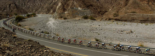 Cyclists race in the Wadi al-Awabi area, west of Muscat, during the third stage of the Tour of Oman on February 16, 2012. German cyclist Marcel Kittel of Project 1T4I team won the 140.5 kilometer race, taking home the red jersey that goes to the race's overall leader. AFP PHOTO/MARWAN NAAMANI (Photo credit should read MARWAN NAAMANI/AFP/Getty Images)