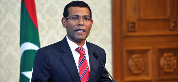 In this photo provided by Maldives President's Office, Maldives President Mohamed Nasheed announces his resignation in a nationally televised address Tuesday afternoon, Feb. 7, 2012 in Male, Maldives. The first democratically elected president of the island nation resigned Tuesday after the police and army clashed in the streets of the island nation amid protests over his controversial arrest of a top judge. (AP Photo/Maldives President's Office)