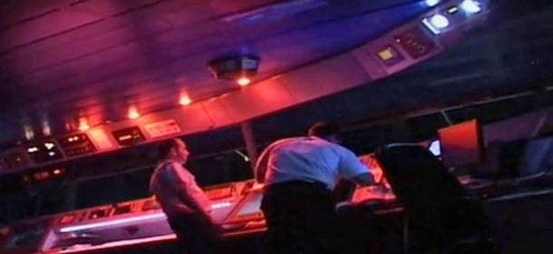 This picture taken from a video broadcast Friday, Feb. 10, 2012, by Italian news TG5 shows unidentified crew members on the bridge of the luxury ship Costa Concordia that run aground off the tiny Tuscany island of Isola del Giglio on Jan. 13, 2012, minutes after it hit a submerged rock while cruising from Civitavecchia to Savona in the Tyrrhenian Sea. The video shows the moments before the order to abandon the ship was given by captain Francesco Schettino. (AP Photo/TG5, handout)