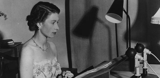 1953: Queen Elizabeth II making a radio broadcast from Auckland, New Zealand during a Royal tour of Australasia. (Photo by Fox Photos/Getty Images)