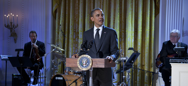 President Barack Obama makes remarks during a celebration of country music event in the East Room of the White House on Monday, Nov. 21, 2011, in Washington. (AP Photo/Evan Vucci)