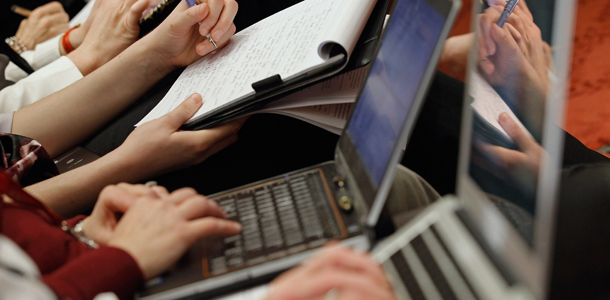 WASHINGTON, DC - JANUARY 19: Reporters use laptop computers, iPads and ink and paper to take notes during a panel discussion organized by NetCoalition about the Protection IP Act (PIPA) and the Stop Online Privacy Act (SOPA) at the U.S. Capitol January 19, 2012 in Washington, DC. Opposed to SOPA and PIPA in their current forms, NetCoalition is a lobying group representing Internet and technology companies, including Google, Yahoo!, Amazon.com, eBay, IAC, Bloomberg LP, Expedia and Wikipedia. (Photo by Chip Somodevilla/Getty Images)