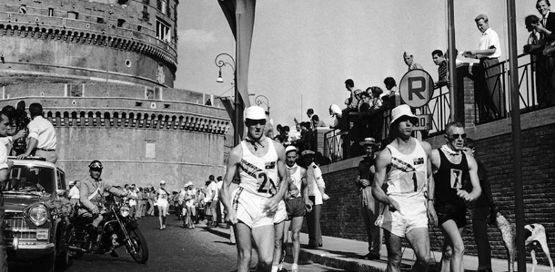 Australia's Noel Freeman, No.2 left, and his compatriot Ron Crawford, No 1 centre, and New Zealand's Norman Read, No7, lead the field at the start of the Olympic Games 50-kilometre walk in Rome on Sept. 7, 1960. The castle of St. Angelo, can be seen in the background. Britain's Don Thompson won the race in 4 hours 25 minutes and 30 seconds, a new Olympic record. (AP Photo)