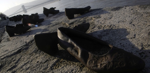 Iron shoes are pictured on the bank of the Danube on January 27, 2012, marking the Holocaust in Hungary. Hundreds of Hungarian Jews had to leave their shoes on the bank before they were shot into the river by Hungarian militaimen during the World War II. The United Nations declared in 2005 the Holocaust Memorial Day on January 27 to commemorate the 6 million Jews and other victims murdered by the Nazis. AFP PHOTO / FERENC ISZA (Photo credit should read FERENC ISZA/AFP/Getty Images)