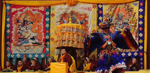Tibetan monks perform during a Tibetan New Year ceremony at the Yonghe Temple, also known as the Lama Temple in Beijing on February 21, 2012. Tibetan New Year is usually a time for festivities in China's ethnically Tibetan areas, but this year some are choosing not to celebrate after deadly unrest and a huge security clampdown. Chinese authorities have implemented what some experts say are unprecedented measures of control on vast swathes of ethnically Tibetan regions following a wave of self-immolations by Buddhist monks and nuns. AFP PHOTO/Mark RALSTON (Photo credit should read MARK RALSTON/AFP/Getty Images)