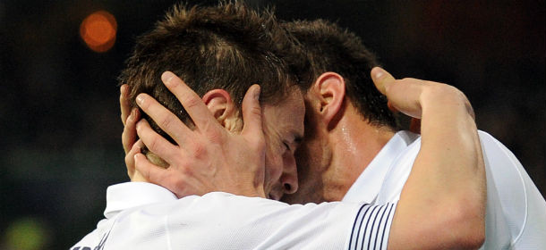 French forward Olivier Giroud (R) kisses his teammate Mathieu Debuchy (FRANCK FIFE/AFP/Getty Images)