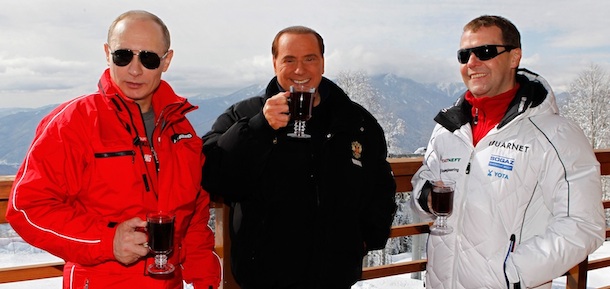 Russia's outgoing President Dmitry Medvedev (R) and newly elected president Vladimir Putin (L) meet with former Italy's Prime minister Silvio Berlusconi at the Rosa Khutor apline ski resort in Krasnaya Polyana, some 50kms from Sochi on March 8, 2012. Italy's ex-prime minister Silvio Berlusconi flew into Russia for a lavish dinner with Vladimir Putin after his old ally's victory in presidential elections, state television said . AFP PHOTO/RIA-NOVOSTI/POOL/DMITRY ASTAKHOV (Photo credit should read DMITRY ASTAKHOV/AFP/Getty Images)