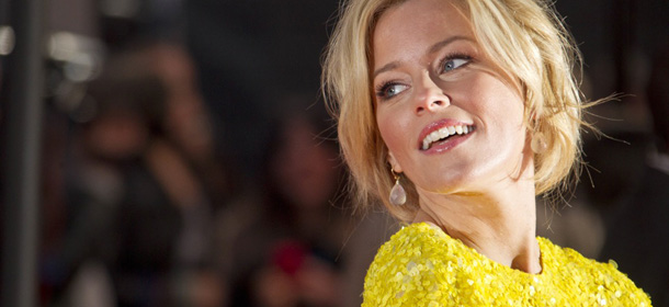 Actress Elizabeth Banks arrives at 'The Hunger Games' UK film premiere at the O2 arena in London, Wednesday, March 14, 2012. Already surrounded with an anticipation matching the 'Twilight' franchise, 'The Hunger Games' opens in theaters on March 23, 2012. (AP Photo/Joel Ryan)