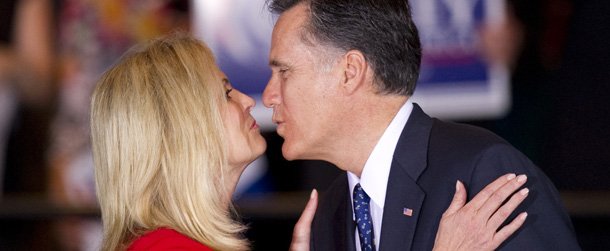 US Presidential candidate Mitt Romney and his wife Ann kiss at his Illinois primary night party March 20, 2012 in Schaumburg, Illinois. AFP PHOTO/DON EMMERT (Photo credit should read DON EMMERT/AFP/Getty Images)