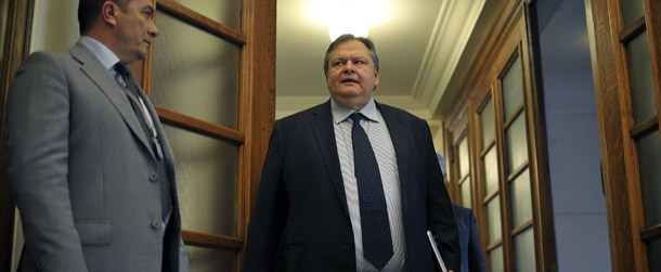 Greek Finance minister Evangelos Venizelos arrives for a cabinet meeting at the Greek Parliament in Athens on March 8, 2012. Greece tallied debt writedown pledges in the final hours today before an evening deadline amid signs of success for the deal which is critical to a new bailout to douse the eurozone crisis.
 AFP PHOTO / LOUISA GOULIAMAKI (Photo credit should read LOUISA GOULIAMAKI/AFP/Getty Images)