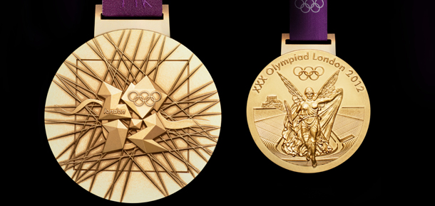 LONDON, UNITED KINGDOM -JULY 27: This handout image supplied by The London Organising Committee of the Olympic and Paralympic Games (LOCOG), shows the medals that will be awarded in the London 2012 Olympic Games, designed by British artist David Watkins. The medal depicts 'Nike', the Greek Goddess of Sport, stepping out of a scene depicting of the Parthenon and Panathinaiko Stadium. The one year countdown to the London 2012 Olympic games was marked with a unique ceremony in Trafalgar Square, with IOC President Jacques Rogge inviting the world's athletes to compete in next summer's games. (Photo by LOCOG via Getty Images)
