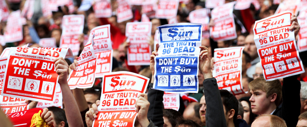 LONDON, ENGLAND - APRIL 14: Liverpool fans hold banners in protest against the Sun newspaper prior to the FA Cup with Budweiser Semi Final match between Liverpool and Everton at Wembley Stadium on April 14, 2012 in London, England. (Photo by Scott Heavey/Getty Images)
