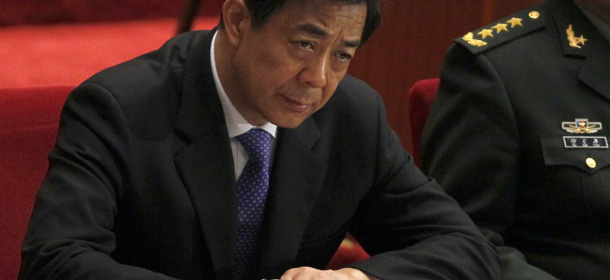 FILE - In this March 13, 2012 file photo, Chongqing party secretary Bo Xilai attends the closing session of the Chinese People's Political Consultative Conference in Beijing's Great Hall of the People, China. China said late Tuesday, April 10, the ousted high-profile leader Bo, once a contender for a seat in the top leadership, has been suspended from key Communist Party positions in the latest development in the country's biggest political crisis in years. Bo was dismissed as Communist Party boss of the mega-city of Chongqing on March 15 shortly after his former police chief fled temporarily to a U.S. consulate, apparently to seek asylum. (AP Photo/Ng Han Guan, File)