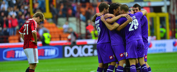 Fiorentina's players celebrate at the end of the Italian Serie A football match between AC Milan and Fiorentina at San Siro Stadium in Milan on April 7, 2012. AFP PHOTO / GIUSEPPE CACACE (Photo credit should read GIUSEPPE CACACE/AFP/Getty Images)