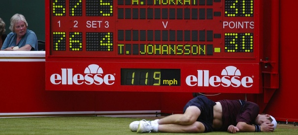 London, UNITED KINGDOM: British player Andrew Murray lies on the floor after falling and injuring himself during his match against Swede Thomas Johansson at Queens Tennis club on the fourth day of the Stella Artois Tennis Championships in London, 9 June 2005. AFP PHOTO/CARL DE SOUZA (Photo credit should read CARL DE SOUZA/AFP/Getty Images)