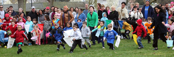 Children run for candy and eggs filled with goodies during the annual Linwood Easter egg hunt, sponsored by the Linwood Recreation Board at All Wars Memorial Park, in Linwood, NJ, Saturday morning March 31, 2012. The rain held off long enough for several hundred children and their families to participate in the event. (AP Photo/The Press of Atlantic City, Vernon Ogrodnek)
