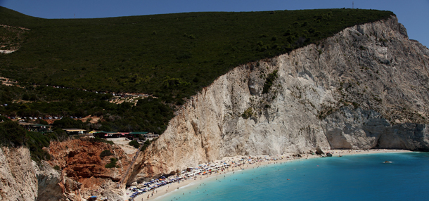 PORTO KATSIKI, GREECE - JULY 27: Bathers relax at the pebble and sand beach beside turquoise waters on July 27, 2010 at Porto Katsiki, on the island of Lefkada, Greece. Lefkada's west coastline has among Europe's most beautiful beaches. (Photo by Sean Gallup/Getty Images)