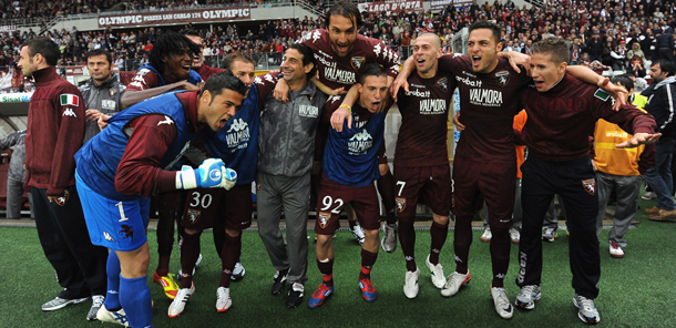 TURIN, ITALY - MAY 20: Torino FC players celebrate after their promotion to the Serie A during the Serie B match between Torino FC and Modena FC at Olimpico Stadium on May 20, 2012 in Turin, Italy. (Photo by Valerio Pennicino/Getty Images)