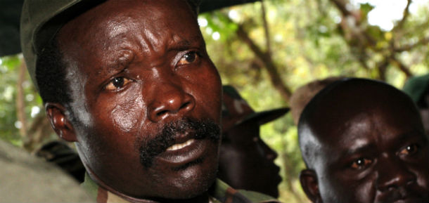 The leader of the Lord's Resistance Army, Joseph Kony answers journalists' questions following a meeting with UN humanitarian chief Jan Egeland Sunday Nov 12 , 2006 at Ri-Kwamba in Southern Sudan. Egeland met with Kony, the elusive leader of Uganda's notorious rebel Lord's Resistance Army and one of the world's most-wanted war crimes suspects, seeking to secure the release of women and children enslaved by the group during their 20-year conflict with the Ugandan government. But Kony denied that his forces are holding prisoners.( AP Photo/Stuart Price, Pool)