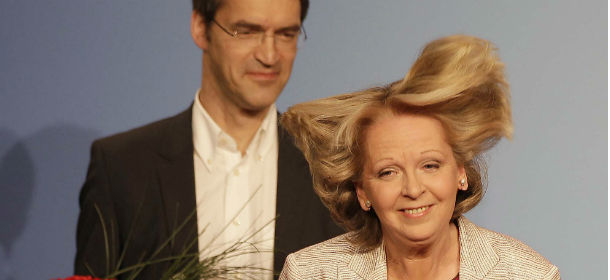 Social Democratic Party top candidate for the state elections of North Rhine-Wesphalia, Hannelore Kraft, and husband Udo react after first results were published in Duesseldorf, Germany, Sunday May 13, 2012. Germany's most populated and industrial state holds parliament elections on Sunday. (AP Photo/Frank Augstein)