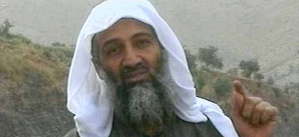 Osama bin Laden is seen in this image broadcast Wednesday April 17, 2002, by the London-based Middle East Broacasting Corp. The Arabic Satellite station MBC reported the tape was delivered to them on Wednesday. Like the images the Qatar-based station Al-Jazeera showed Tuesday April 16 the tape aired by MBC was a montage of various material, including old statements from bin Laden and his aides and images of the falling World Trade Center towers. The tapes appeared to be different. Bin Laden's whereabouts are unknown. (AP Photo/MBC via APTN) ** TV OUT **