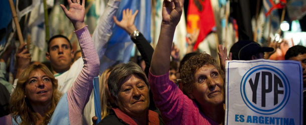 LaPresse03-05-2012CronacaBuenos Aires, si' definitivo del Parlamento argentino a nazionalizzazione YPFGovernment supporters celebrate outside the Congress in Buenos Aires, Argentina, Thursday, May 3, 2012. Argentina's takeover of its formerly state-owned energy company from Spanish shareholders won easy approval from legislators Thursday night. Congress' lower house voted 207-32 to give the force of law to what President Cristina Fernandez surprisingly decreed two weeks earlier: the expropriation of the Spanish company Repsol SA's $10.5 billion stake in the YPF oil company, without a single centavo paid in advance.