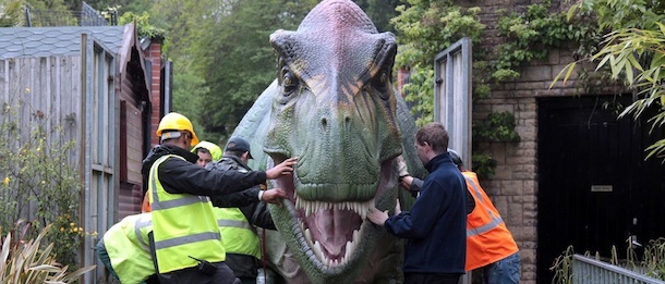 BRISTOL, ENGLAND - MAY 14: A life size animatronic tyrannosaurus rex dinosaur arrives at Bristol Zoo Gardens on May 14, 2012 in Bristol, England. The twelve dinosaurs - which form part of the zoo's summer exhibition DinoZoo which opens later this month - arrived this morning after being transported in crates from Texas, USA. (Photo by Matt Cardy/Getty Images)