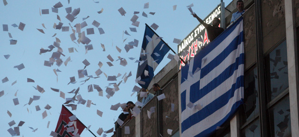 Members of Neo-Nazi party Golden Dawn celebrate at Thessaloniki offices on 6 May, 2012. Greece's two main parties suffered big losses in elections on May 6, exit polls showed, throwing into doubt the eurozone state's austerity plans after a strong showing by protest groups, including the neo-Nazis. Golden Dawn was also set to enter parliament for the first time since the end of the military junta in 1974, with six to eight percent, making it the sixth-biggest party in the 300-seat chamber with some 25 lawmakers. .AFP PHOTO / SAKIS MITROLIDIS (Photo credit should read SAKIS MITROLIDIS/AFP/GettyImages)