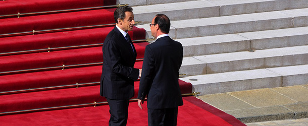 France's President Francois Hollande (R) talks with his predecessor Nicolas Sarkozy (L) as he arrives at the presidential Elysee Palace in Paris prior to the start of the investiture ceremony on May 15, 2012. AFP PHOTO / MEHDI FEDOUACH (Photo credit should read MEHDI FEDOUACH/AFP/GettyImages)